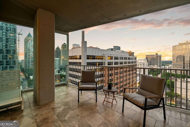20 10th St NW Unit 2003, Atlanta, GA 30309 - balcony at dusk featuring a view of city