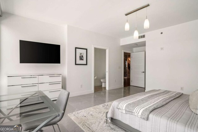 20 10th St NW Unit 2003, Atlanta, GA 30309 - bedroom featuring marble finish flooring and baseboards