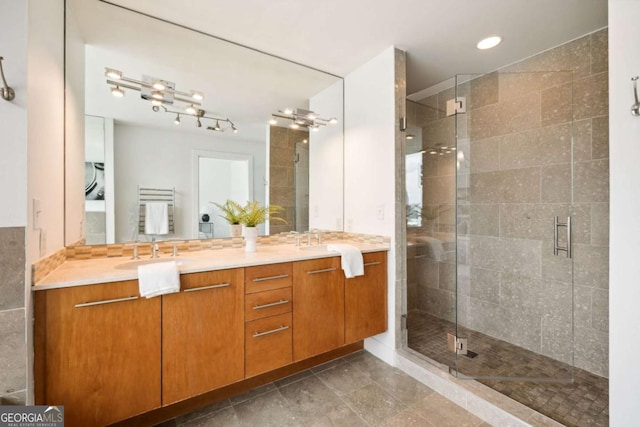 20 10th St NW Unit 2003, Atlanta, GA 30309 - bathroom with a stall shower, double vanity, and recessed lighting