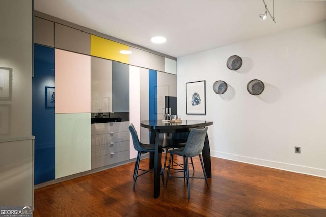 20 10th St NW Unit 2003, Atlanta, GA 30309 - dining area with dark wood-type flooring and baseboards