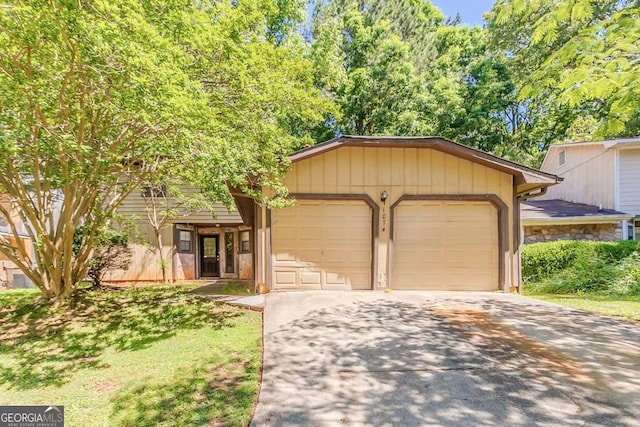 1074 Cherokee Hts, Stone Mountain, GA 30083 - view of front of home with asphalt driveway and a garage