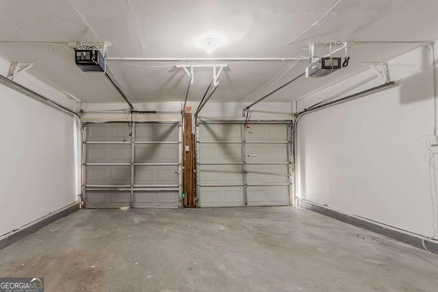 1074 Cherokee Hts, Stone Mountain, GA 30083 - garage featuring a garage door opener