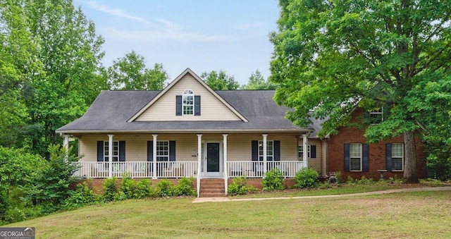 418 Whisper Wood Way, Locust Grove, GA 30248 - country-style home with a front yard and covered porch
