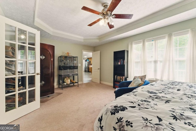 418 Whisper Wood Way, Locust Grove, GA 30248 - bedroom featuring crown molding, a raised ceiling, carpet flooring, baseboards, and a textured ceiling
