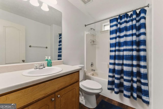 418 Whisper Wood Way, Locust Grove, GA 30248 - full bathroom with shower / tub combo, toilet, vanity, and wood finished floors