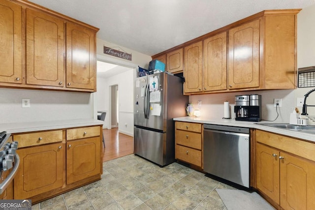 418 Whisper Wood Way, Locust Grove, GA 30248 - kitchen with stainless steel appliances and brown cabinets