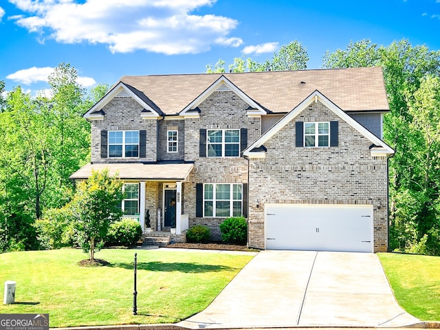7860 Bristol Valley Dr, Cumming, GA 30028 - view of front facade with concrete driveway, a front yard, a garage, and brick siding