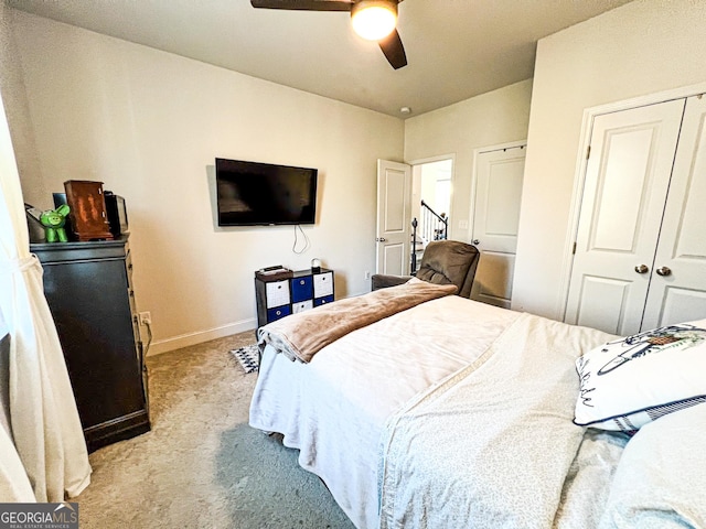 7860 Bristol Valley Dr, Cumming, GA 30028 - bedroom featuring light colored carpet, baseboards, a closet, and a ceiling fan
