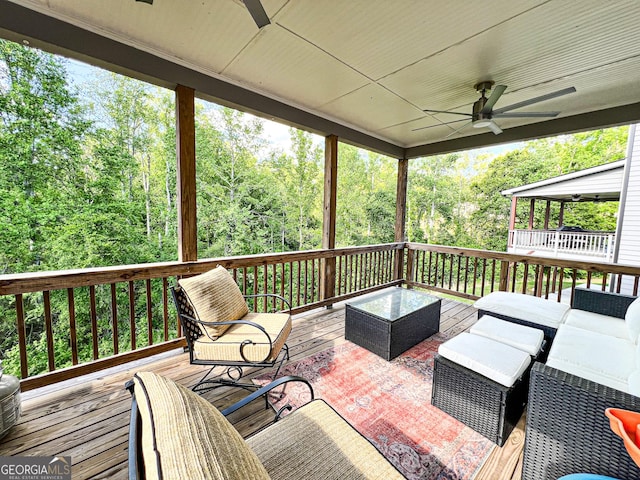 7860 Bristol Valley Dr, Cumming, GA 30028 - wooden deck with a ceiling fan and outdoor lounge area