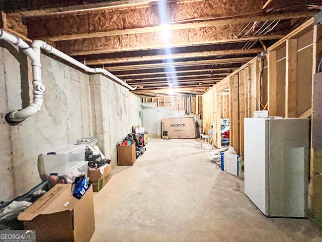 7860 Bristol Valley Dr, Cumming, GA 30028 - unfinished basement with freestanding refrigerator