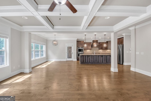 859 Heritage Lake Way, Grayson, GA 30017 - unfurnished living room featuring coffered ceiling, beamed ceiling, crown molding, ceiling fan, and baseboards