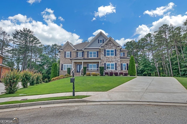 859 Heritage Lake Way, Grayson, GA 30017 - craftsman-style home featuring stone siding, a front yard, and driveway