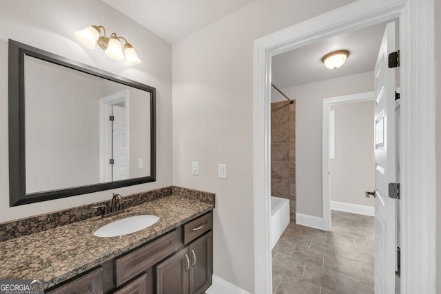 859 Heritage Lake Way, Grayson, GA 30017 - full bath with vanity, baseboards, and bathtub / shower combination