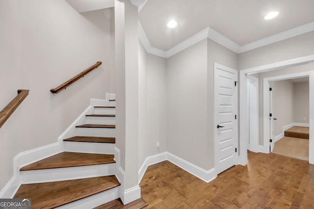 859 Heritage Lake Way, Grayson, GA 30017 - stairway featuring ornamental molding, wood finished floors, recessed lighting, and baseboards
