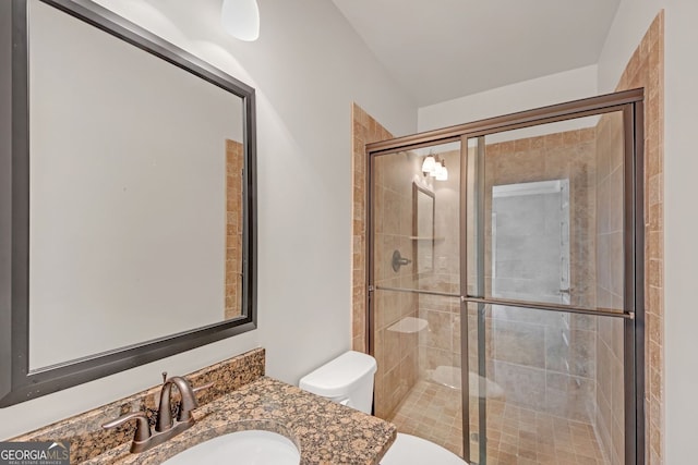 859 Heritage Lake Way, Grayson, GA 30017 - full bathroom featuring toilet, a shower stall, and vanity