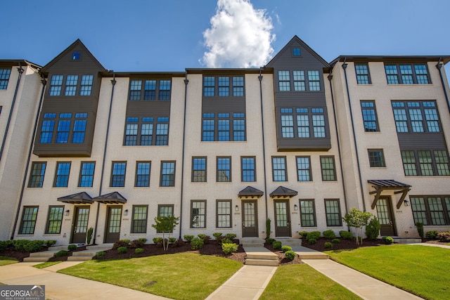 6790 Encore Blvd, Sandy Springs, GA 30328 - view of property with a front yard