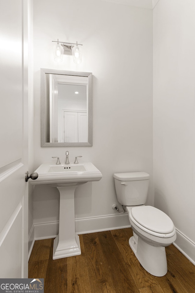 6790 Encore Blvd, Sandy Springs, GA 30328 - bathroom featuring toilet and wood finished floors