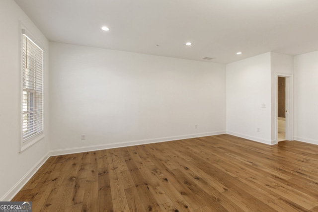 6790 Encore Blvd, Sandy Springs, GA 30328 - spare room with wood finished floors and recessed lighting