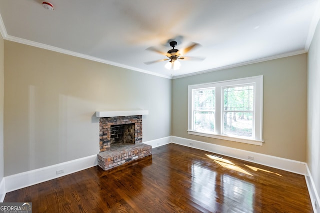 564 Bailey Mill Rd, Yatesville, GA 31097 - unfurnished living room with crown molding, ceiling fan, wood finished floors, and a fireplace with raised hearth
