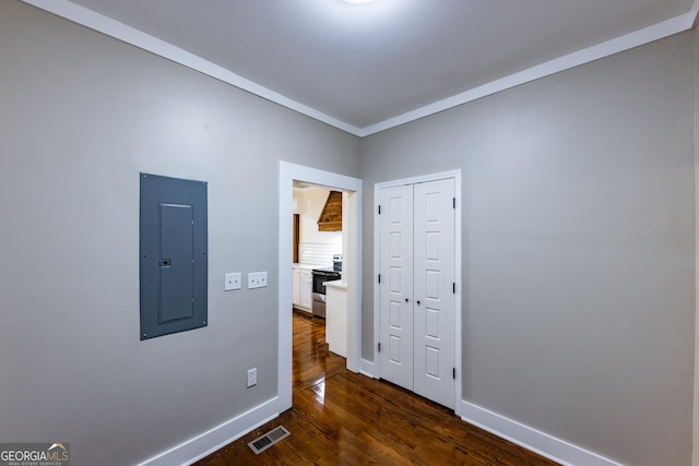 564 Bailey Mill Rd, Yatesville, GA 31097 - corridor with electric panel, dark wood-type flooring, and ornamental molding