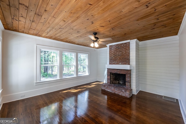 564 Bailey Mill Rd, Yatesville, GA 31097 - unfurnished living room featuring wood ceiling, ceiling fan, ornamental molding, a fireplace, and wood finished floors