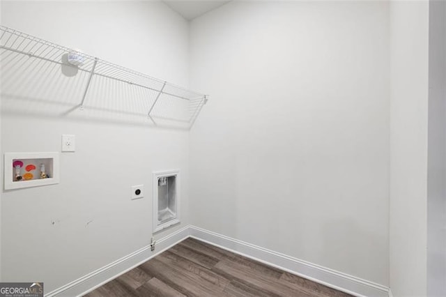 1809 Hanwoo Ln, Powder Springs, GA 30127 - laundry room featuring dark wood finished floors, hookup for a washing machine, hookup for an electric dryer, and baseboards