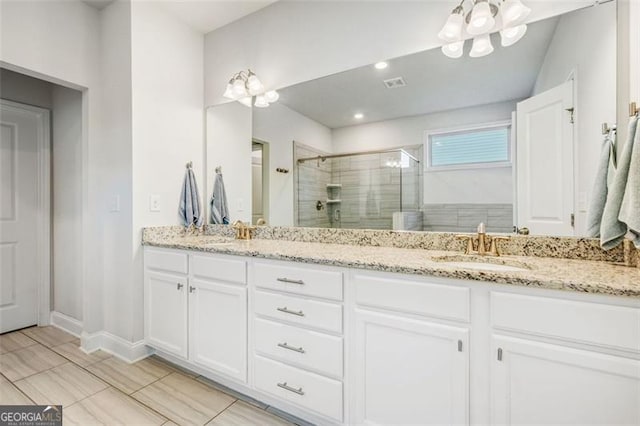 1809 Hanwoo Ln, Powder Springs, GA 30127 - full bath with a stall shower, double vanity, baseboards, and a chandelier