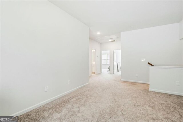 1809 Hanwoo Ln, Powder Springs, GA 30127 - spare room with light colored carpet, baseboards, and recessed lighting