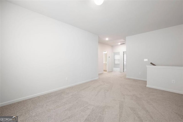 1809 Hanwoo Ln, Powder Springs, GA 30127 - unfurnished room featuring light colored carpet, baseboards, and recessed lighting