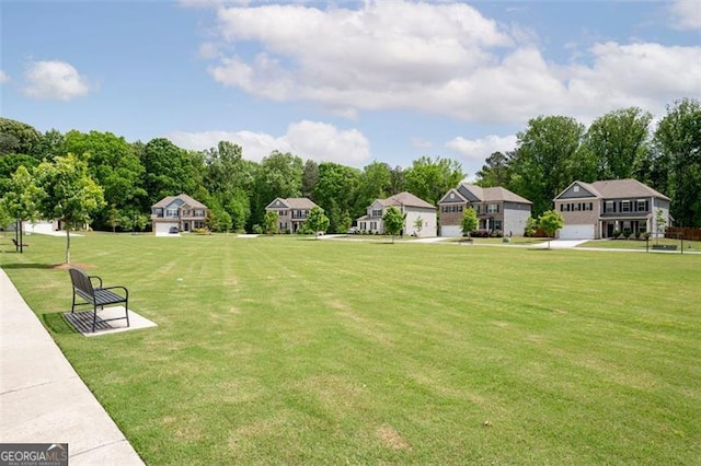 1809 Hanwoo Ln, Powder Springs, GA 30127 - view of green lawn with view of wooded area