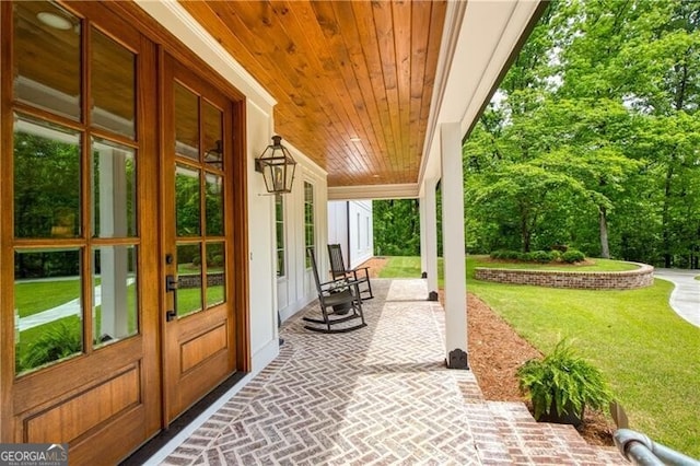 view of patio featuring covered porch
