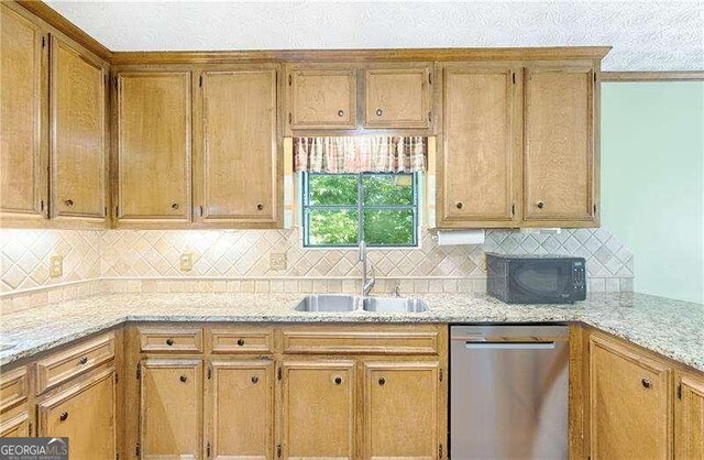 3625 Stonehenge Way NE, Marietta, GA 30066 - kitchen with stainless steel dishwasher, a sink, black microwave, tasteful backsplash, and light stone countertops