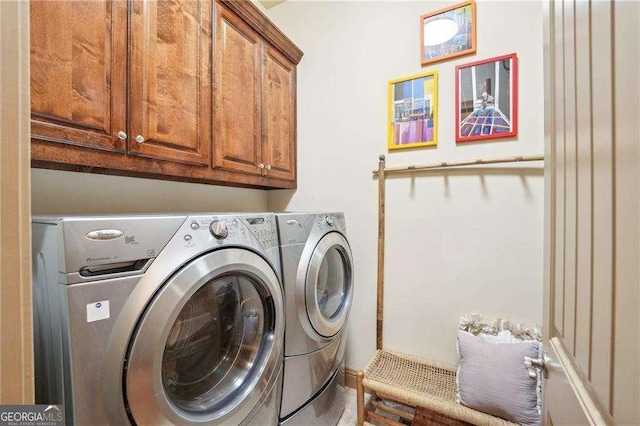 4162 Cumberland Point Dr, Gainesville, GA 30504 - clothes washing area featuring cabinet space and separate washer and dryer