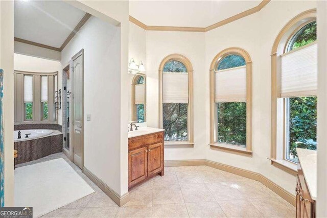 4162 Cumberland Point Dr, Gainesville, GA 30504 - full bath with ornamental molding, baseboards, vanity, a bath, and tile patterned floors