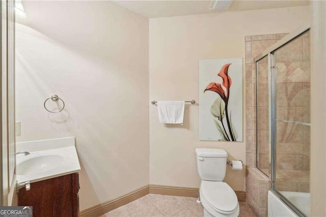 4162 Cumberland Point Dr, Gainesville, GA 30504 - full bath with baseboards, tile patterned floors, toilet, vanity, and combined bath / shower with glass door