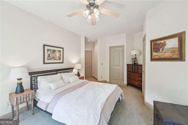 4162 Cumberland Point Dr, Gainesville, GA 30504 - bedroom featuring light colored carpet, baseboards, and a ceiling fan