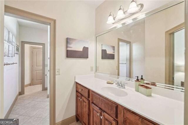 4162 Cumberland Point Dr, Gainesville, GA 30504 - bathroom with vanity, tile patterned floors, and baseboards