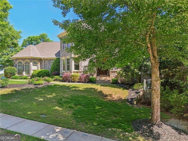4162 Cumberland Point Dr, Gainesville, GA 30504 - view of front of home featuring a front yard and stone siding