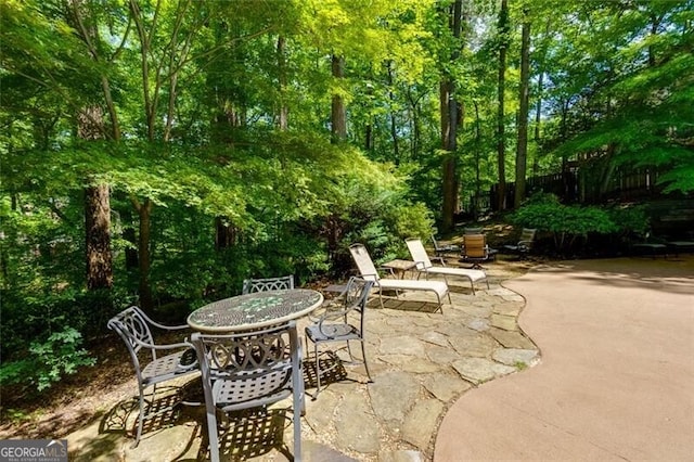 view of patio featuring outdoor dining area
