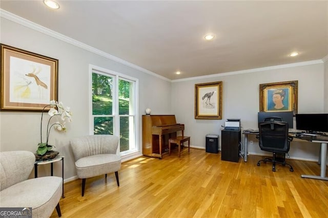 office space featuring light wood-style flooring, recessed lighting, baseboards, and crown molding