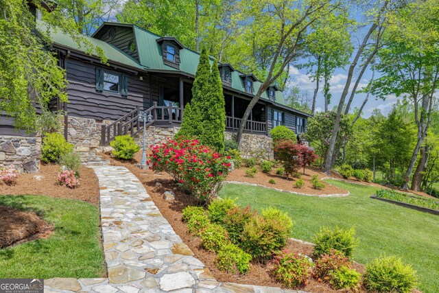 259 Eagle Chase Cir, Dillard, GA 30537 - view of green lawn featuring covered porch