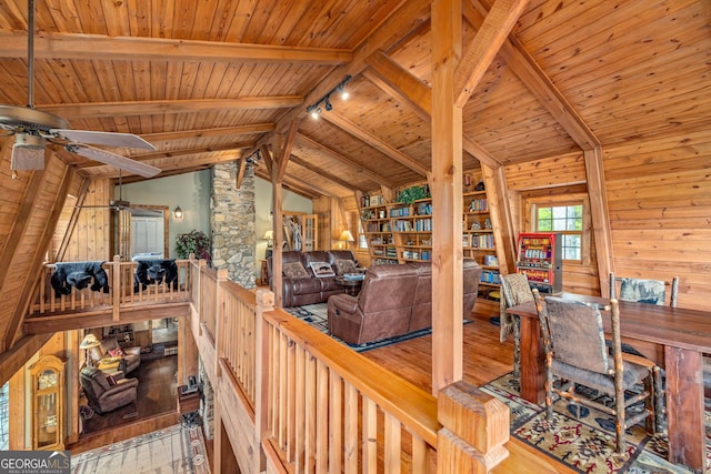259 Eagle Chase Cir, Dillard, GA 30537 - living room with wood-type flooring, wooden ceiling, ceiling fan, track lighting, and wood walls