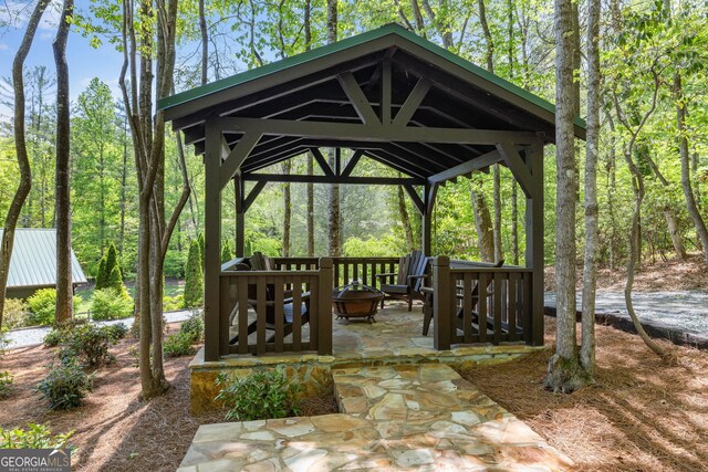 259 Eagle Chase Cir, Dillard, GA 30537 - view of home's community with a gazebo, a fire pit, and a patio