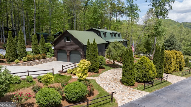 259 Eagle Chase Cir, Dillard, GA 30537 - view of front of home with driveway, fence, and metal roof