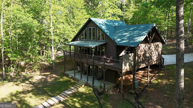 view of outdoor structure featuring a forest view