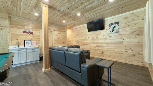 cinema room featuring wooden ceiling, wood walls, recessed lighting, and dark wood finished floors
