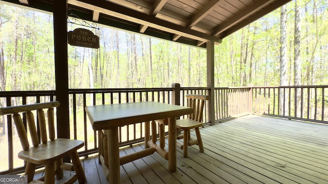 deck featuring a view of trees