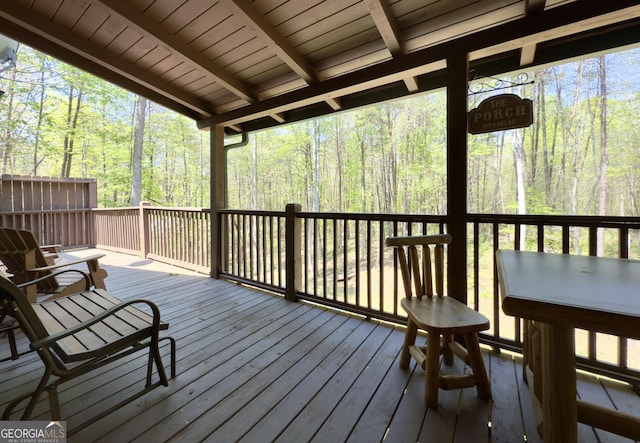 deck with a wooded view