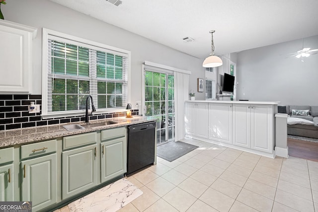 4104 Glenaire Way NW, Acworth, GA 30101 - kitchen featuring dishwasher, open floor plan, light tile patterned flooring, decorative backsplash, and decorative light fixtures