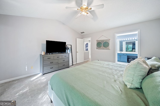 4104 Glenaire Way NW, Acworth, GA 30101 - bedroom with carpet floors, vaulted ceiling, a ceiling fan, and ensuite bathroom
